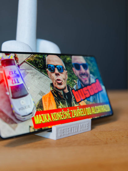 "F*CK DEZO" Stojánek na Mobil